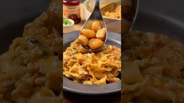 Garlicky Garlic Noodles with Pork and Chili Crisp recipe thumbnail
