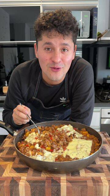 Foto de la receta Carne molida con plátano maduro, hogao y queso