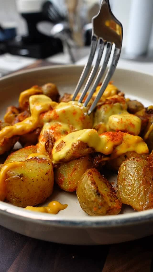 "Easy Cheesy Patatas Bravas: A Quick and Delicious Twist!" recipe thumbnail